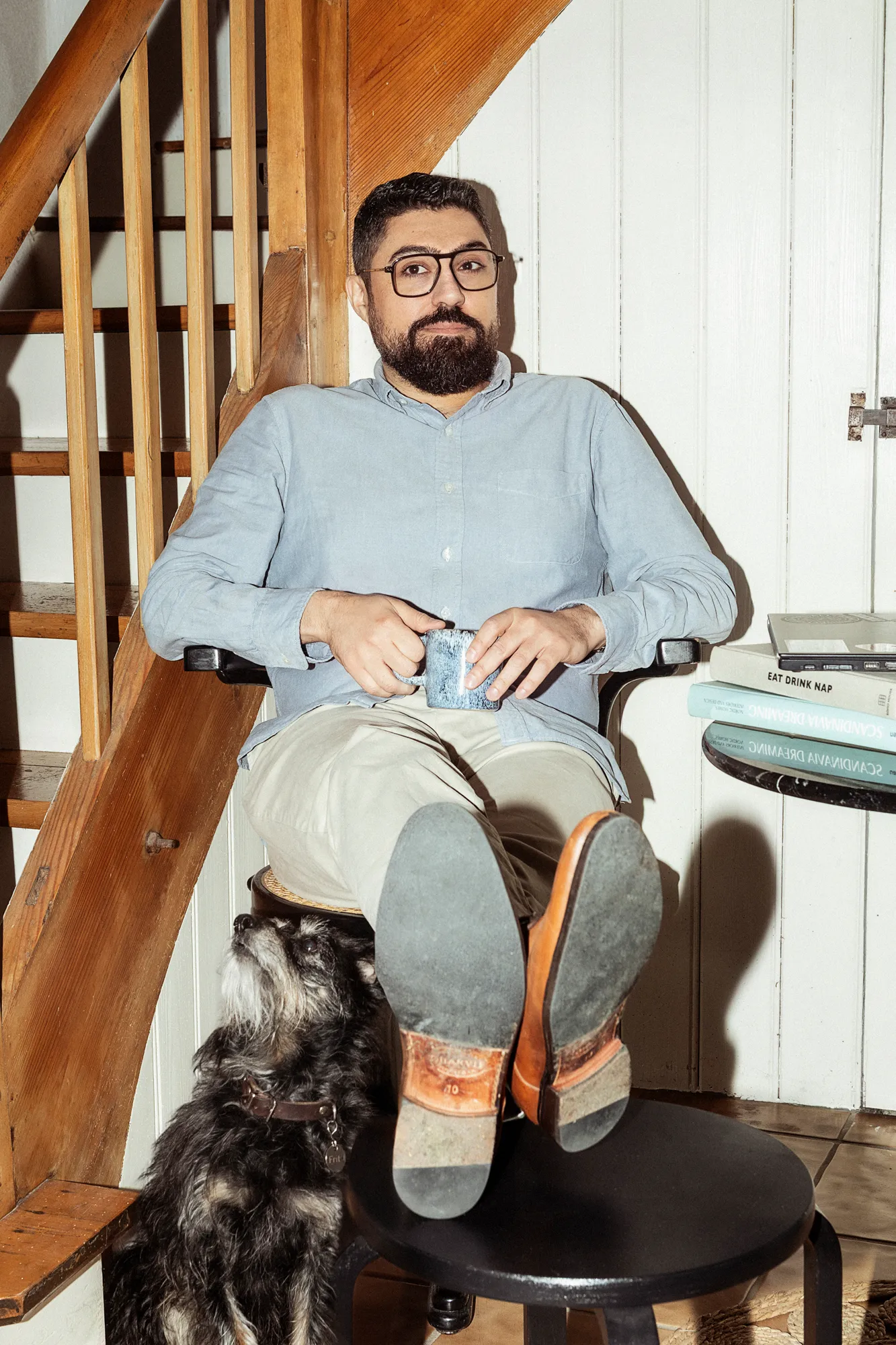 Editorial portrait at home with a dog