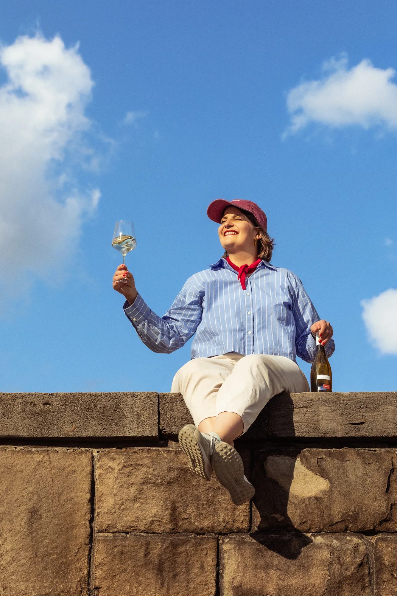Wine brand portrait against a stone wall